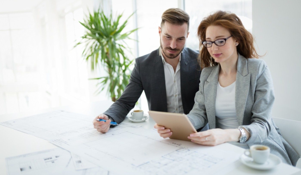 portrait-of-young-architect-woman-on-meeting-KFZCE3A